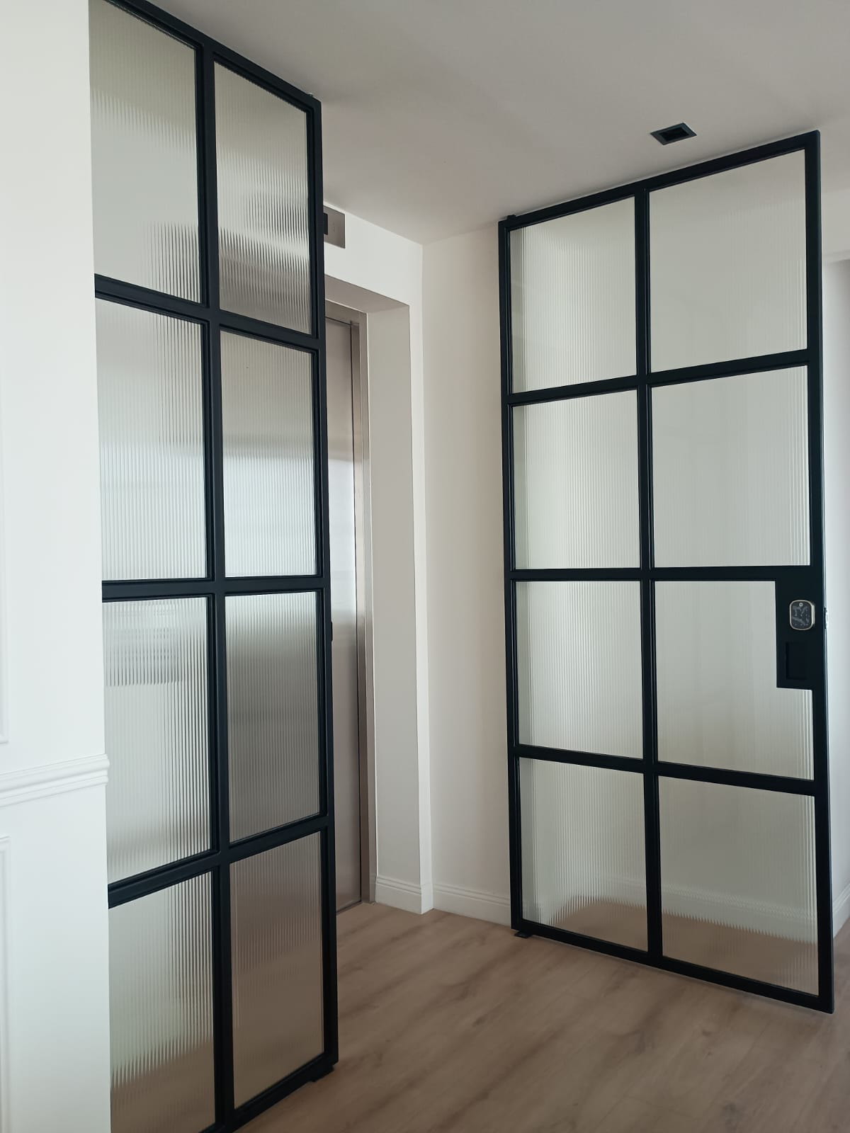 puerta herreria cristal astriado